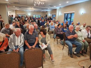 Crowd expresses concerns about removing Cheat Lake land from FERC protection, during public meeting on Lake Lynn hydro project license